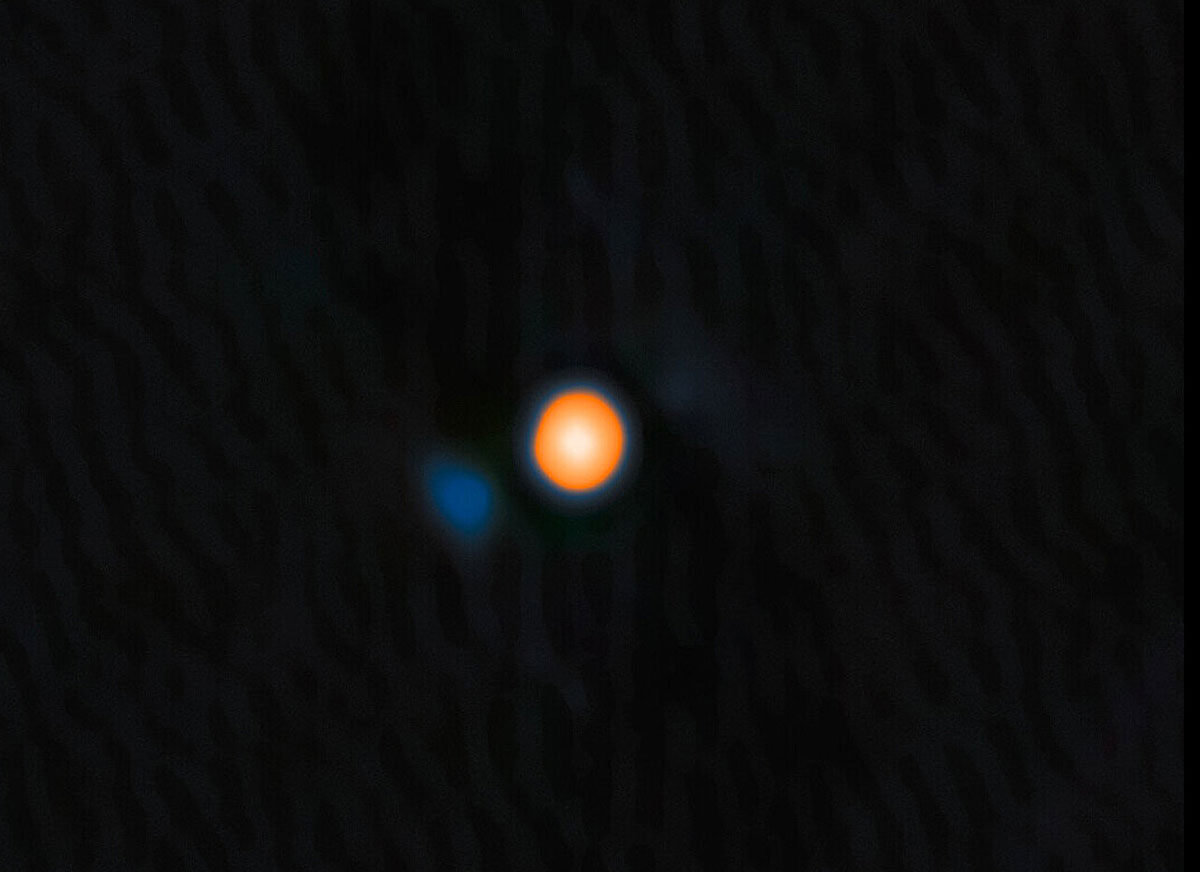 Der stellare Begleiter (blau) eines der hellsten Sterne am Nachthimmel.Copyright: International Gemini Observatory/NOIRLab/NSF/AURA. Processing: M. Zamani (NSF NOIRLab)