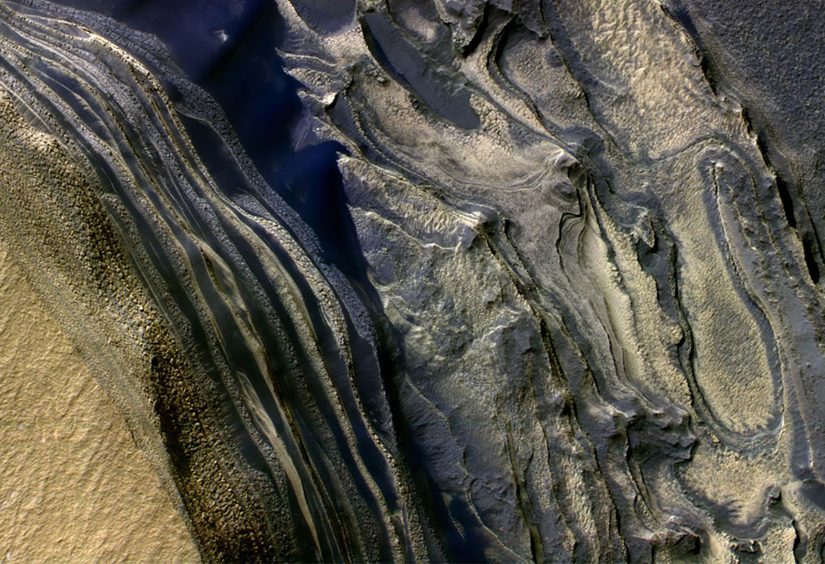 Eisschichten auf dem Mars, wie jene in der Mars-Region Chasma Boreale, bewahren ein empfindliches Archiv klimatischer Schwankungen.Copyright: NASA/JPL/Univ. of Arizona