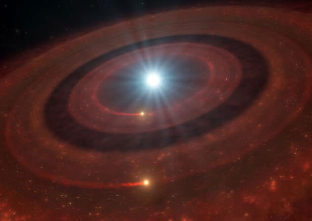 Künstlerische Darstellung der Trümmerscheiben um den Weißen Zwerg „J1328−1450“. Copyright/Quelle: ESO/L. Calçada